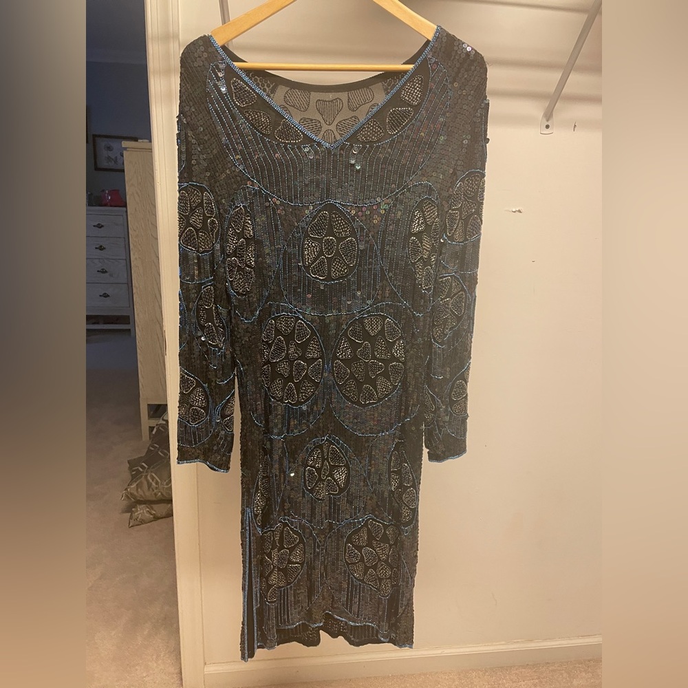 Beautiful beaded dress in black with blue sparkle. Perfect for holidays.